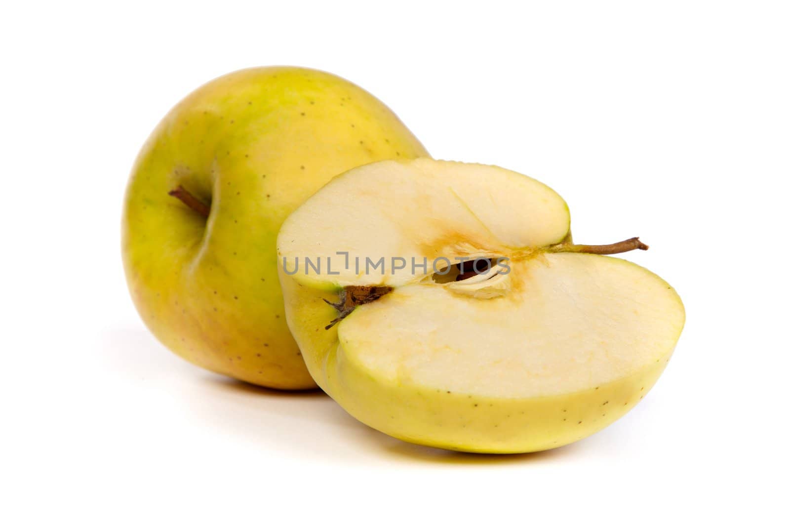 Cross section of green apple, showing pips, and core. Isolated on white,