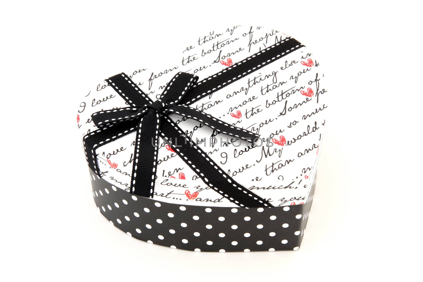 perspective of isolated black and white holiday gift box in heart shape