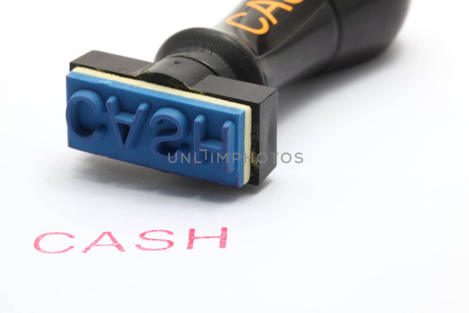 closeup of cash letter on rubber stamp isolated on white background