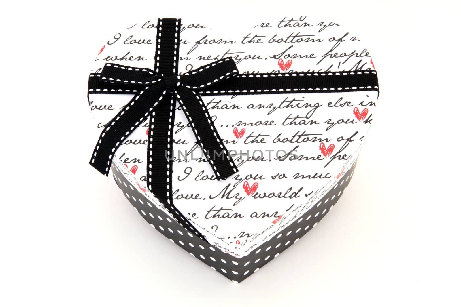 isolated black and white holiday gift box in heart shape