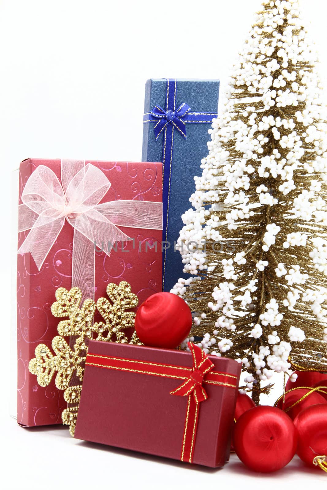set of holiday boxes with christmas tree and ornament
