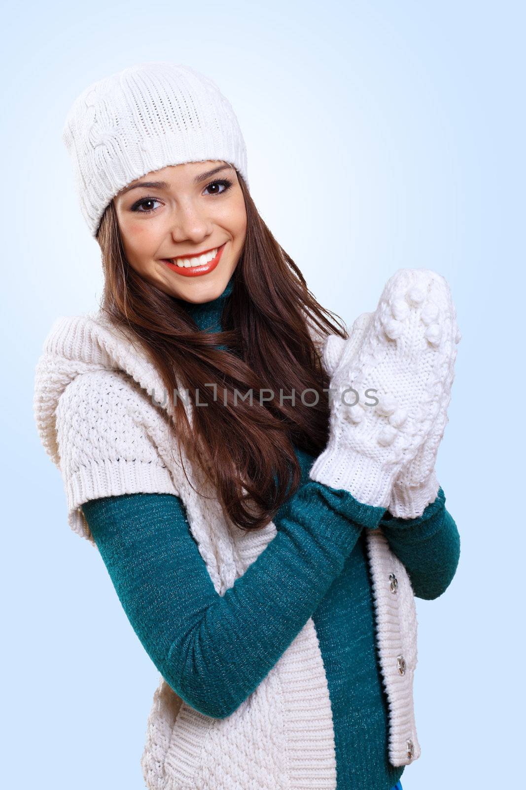 Young pretty woman with lomng hair wearing warm pullover