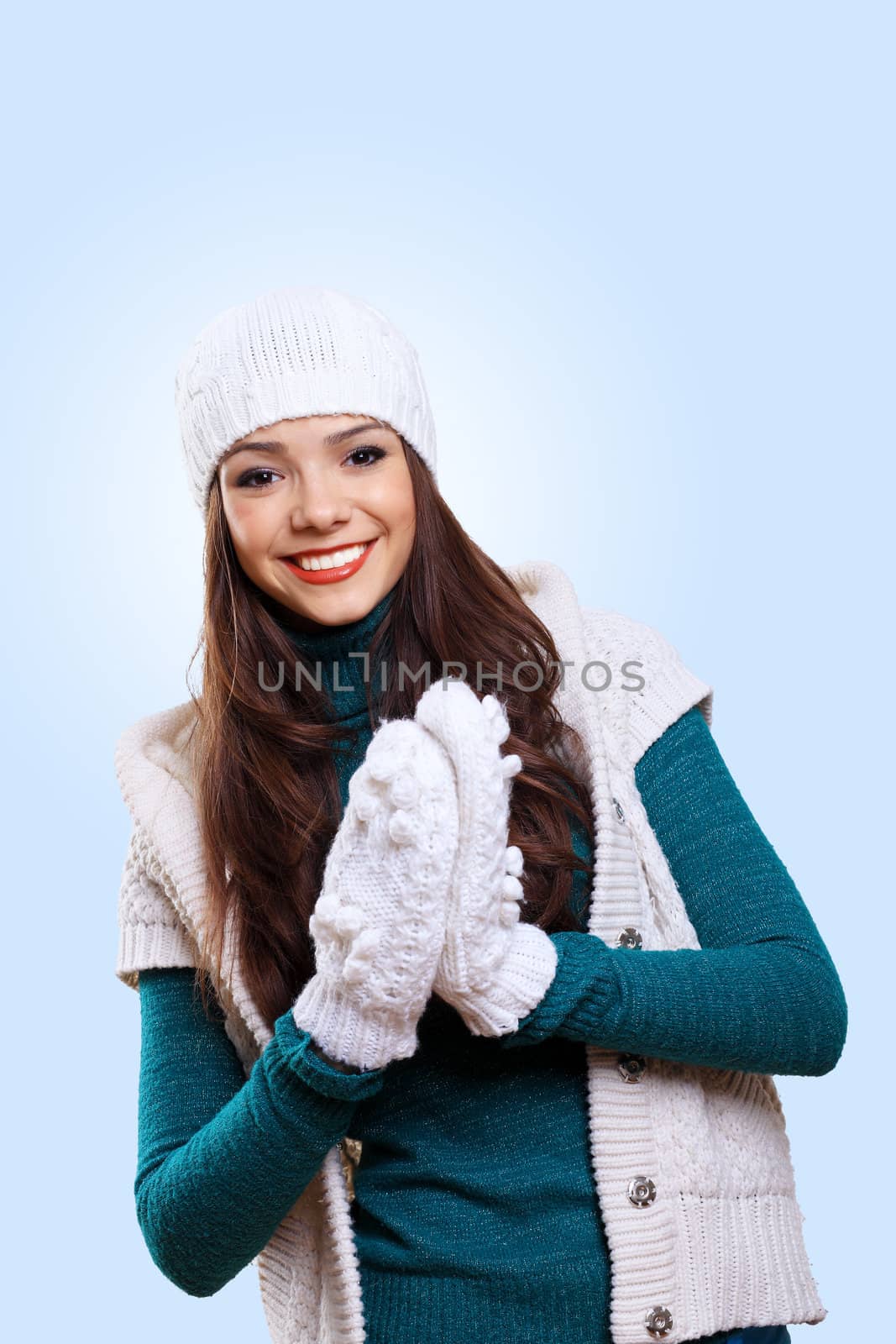 Young woman wearing warm sweater by sergey_nivens