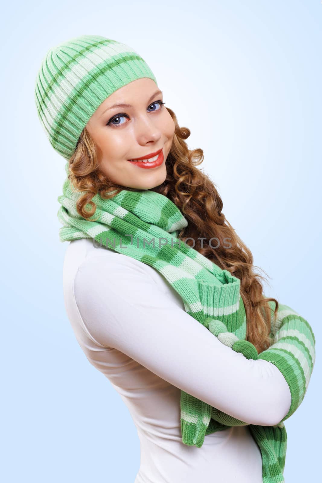 Young pretty woman with lomng hair wearing warm pullover