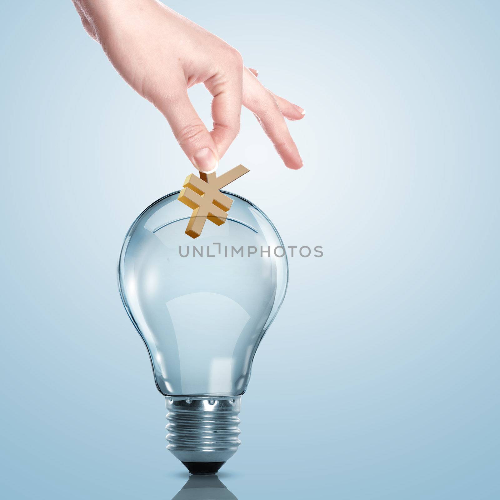 Hand and money inside an electric light bulb
