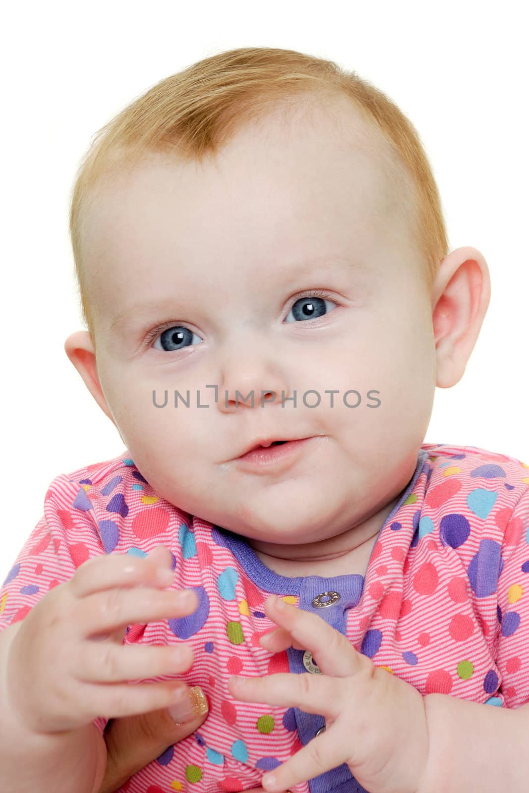 A sweet happy baby 3 month young.Taken on a white background.