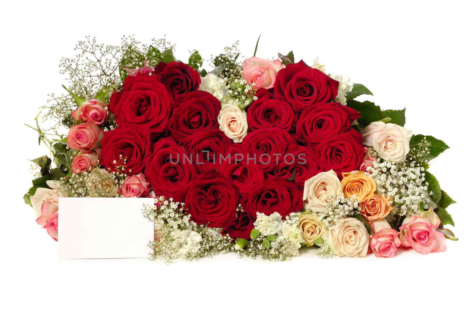 Bouquet of rose flowers with a blank gift card, isolated on white background. The roses are arranged in heart shape.