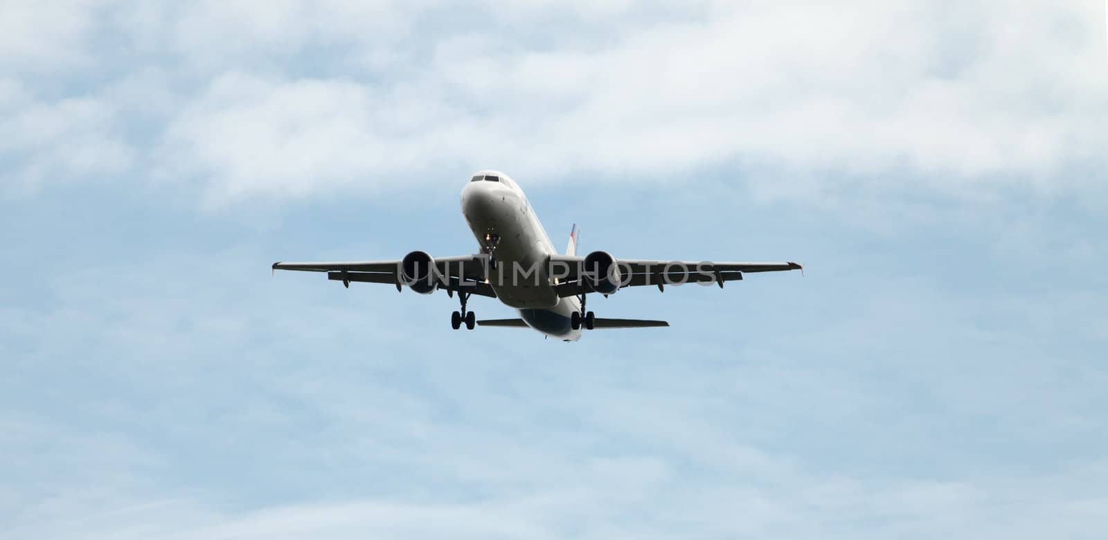 Passenger Aircraft Airbus 320 coming in to land a front view