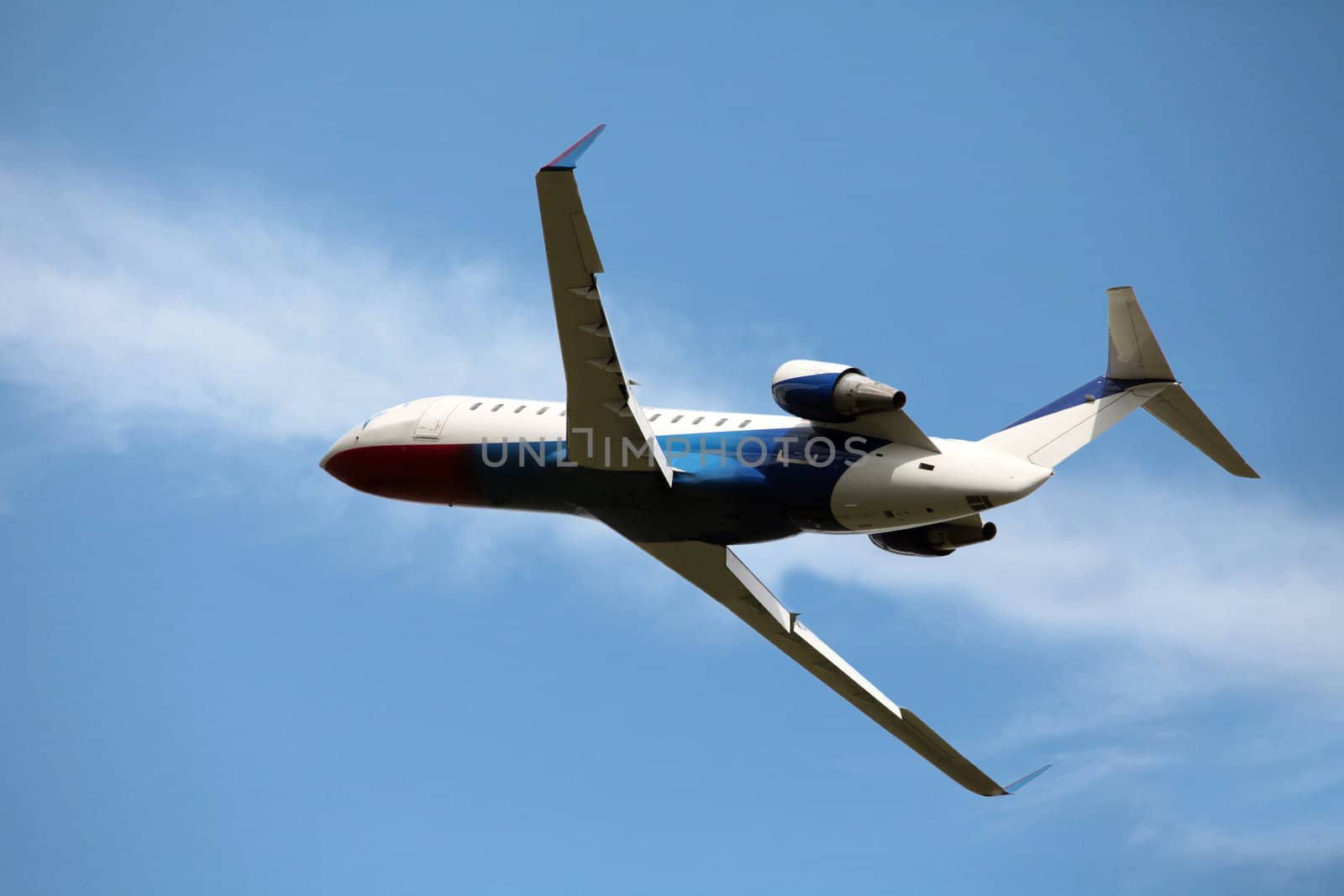 business jet in the blue sky