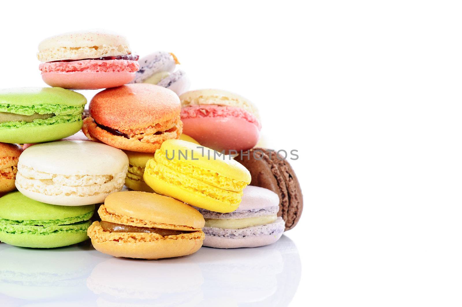 Colorful macaroons on white background 