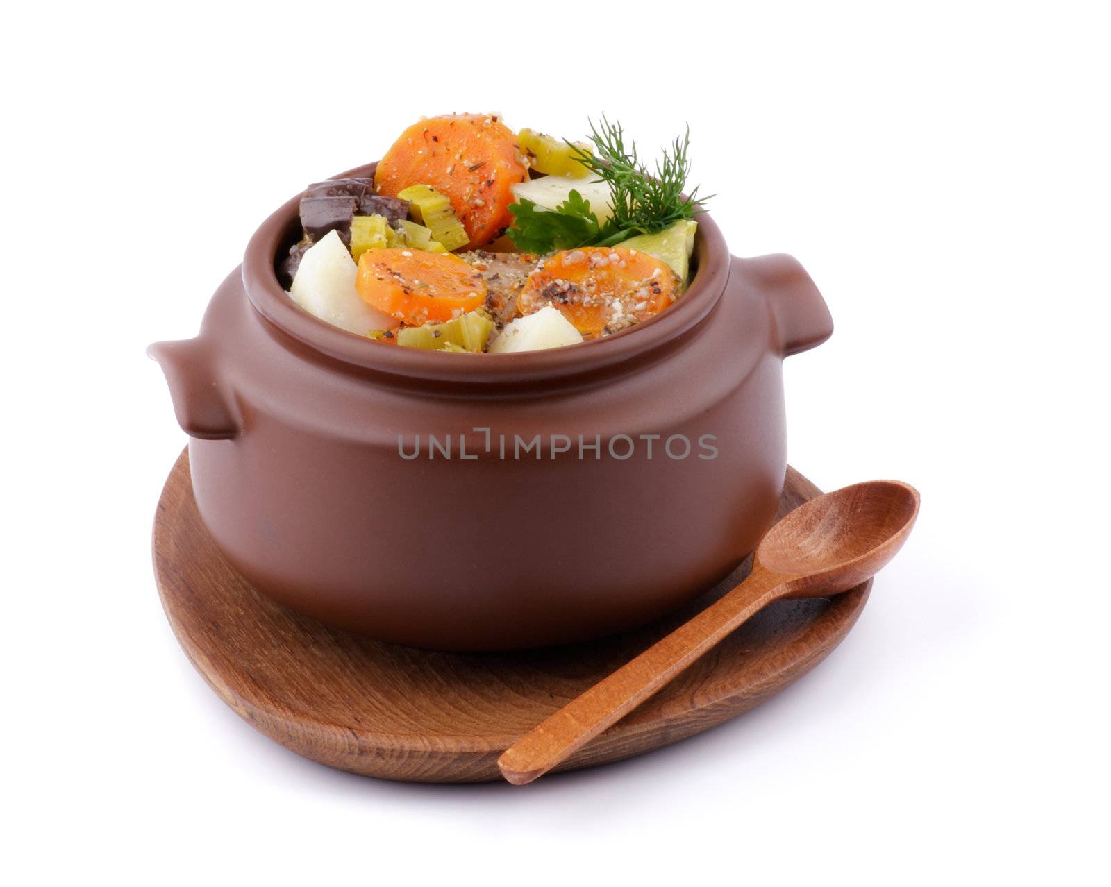 Vegetable Stew in Brown Pot on Wooden Plate with Spoon isolated on white background