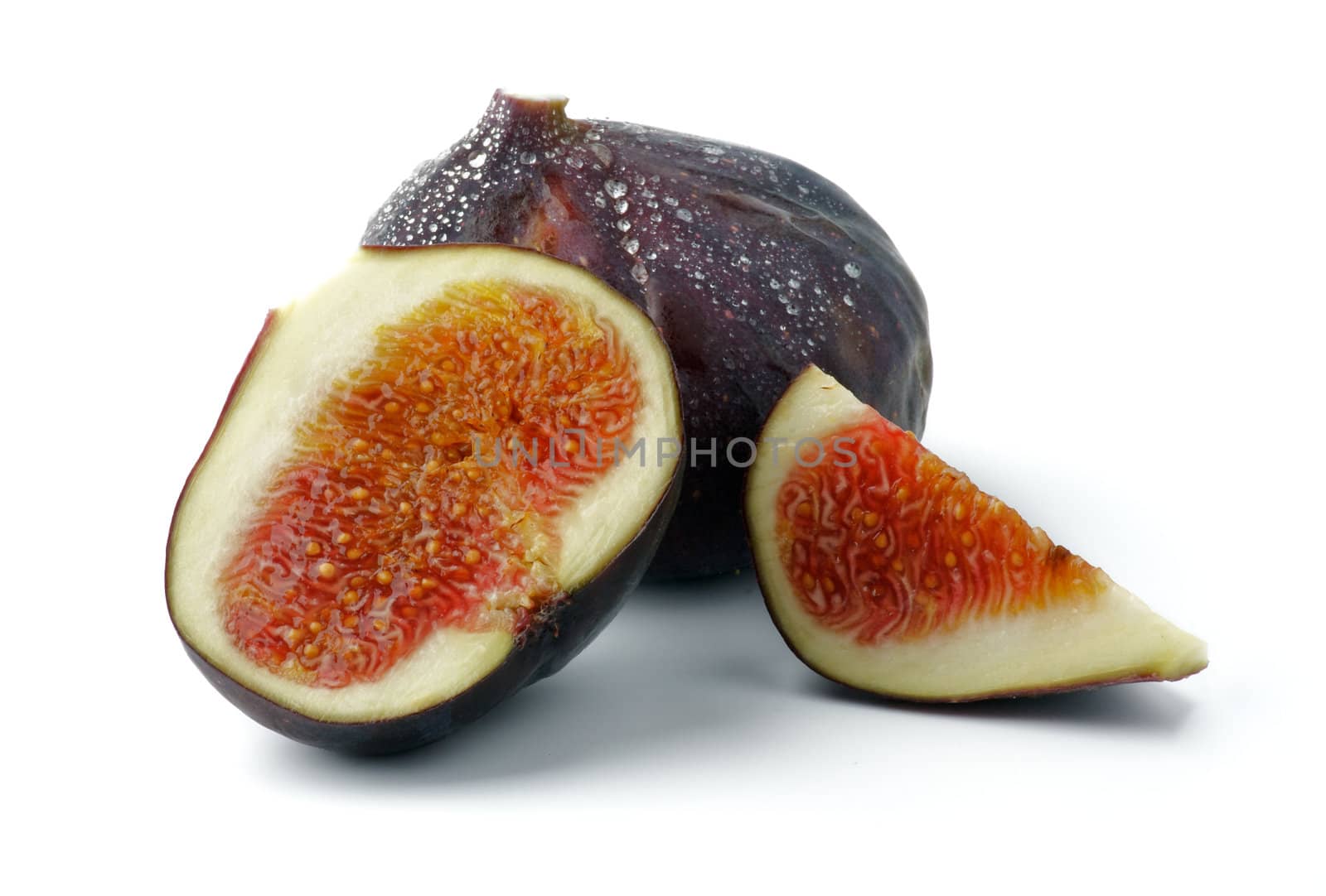 Perfect Ripe Figs full body and slices isolated on white background