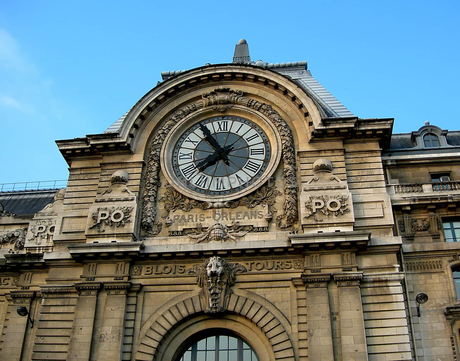 Old gable with clock of the famous art museum d'Orsay in Paris in France