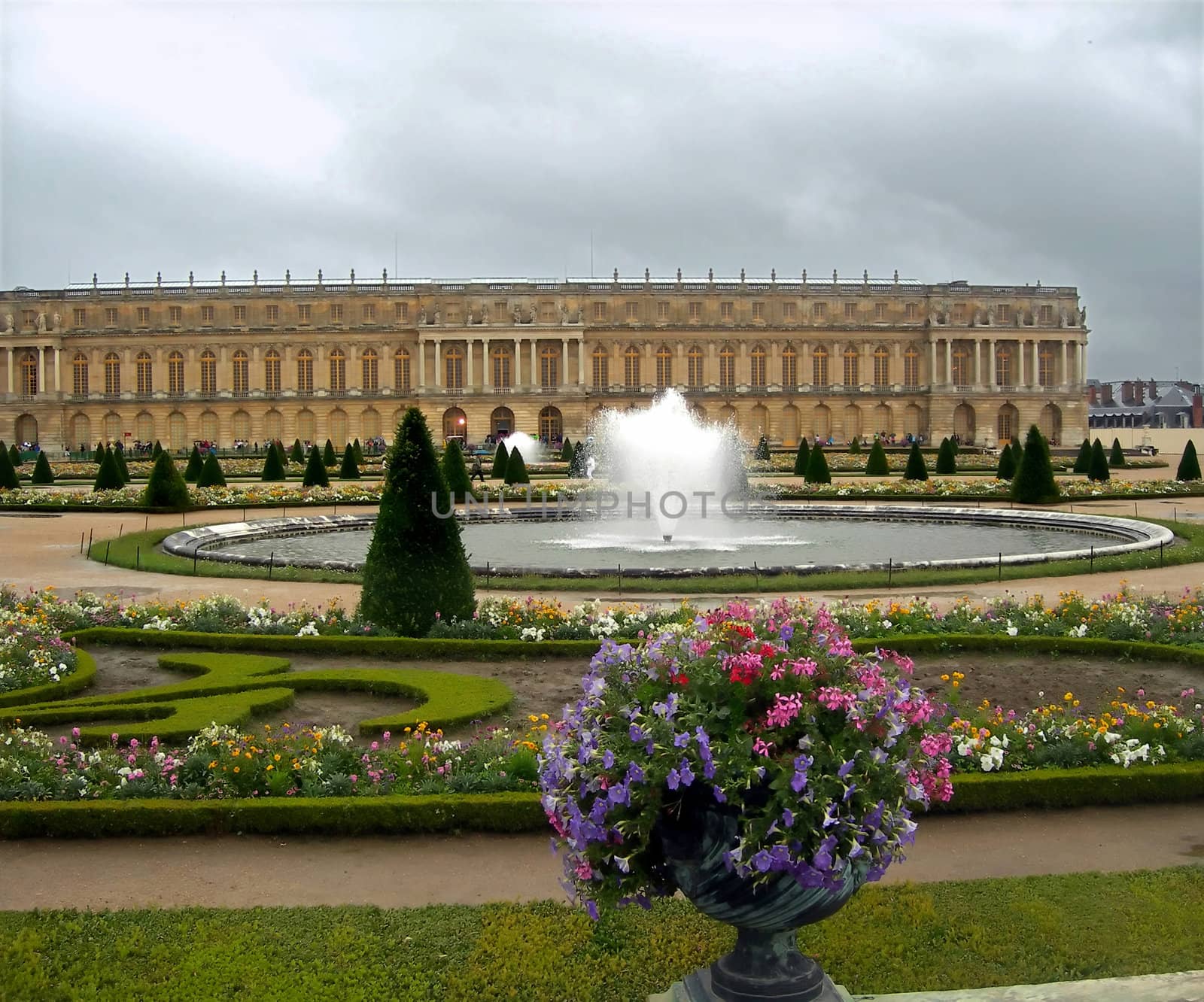 Castle with beautiful gardens in Versailles in France. 