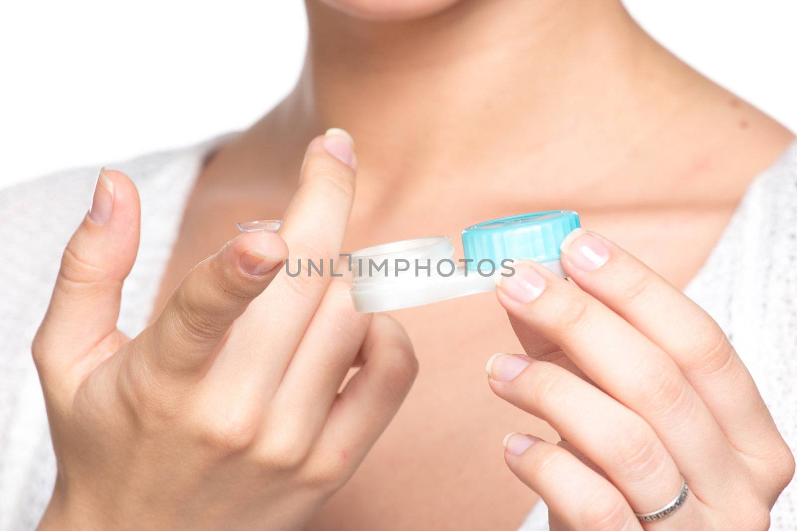 Contact lenses box in womans hand by gsdonlin