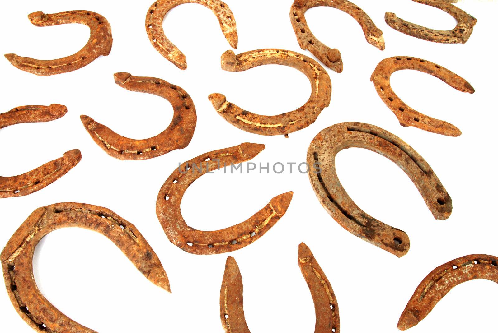 Rusty horseshoes by drakodav