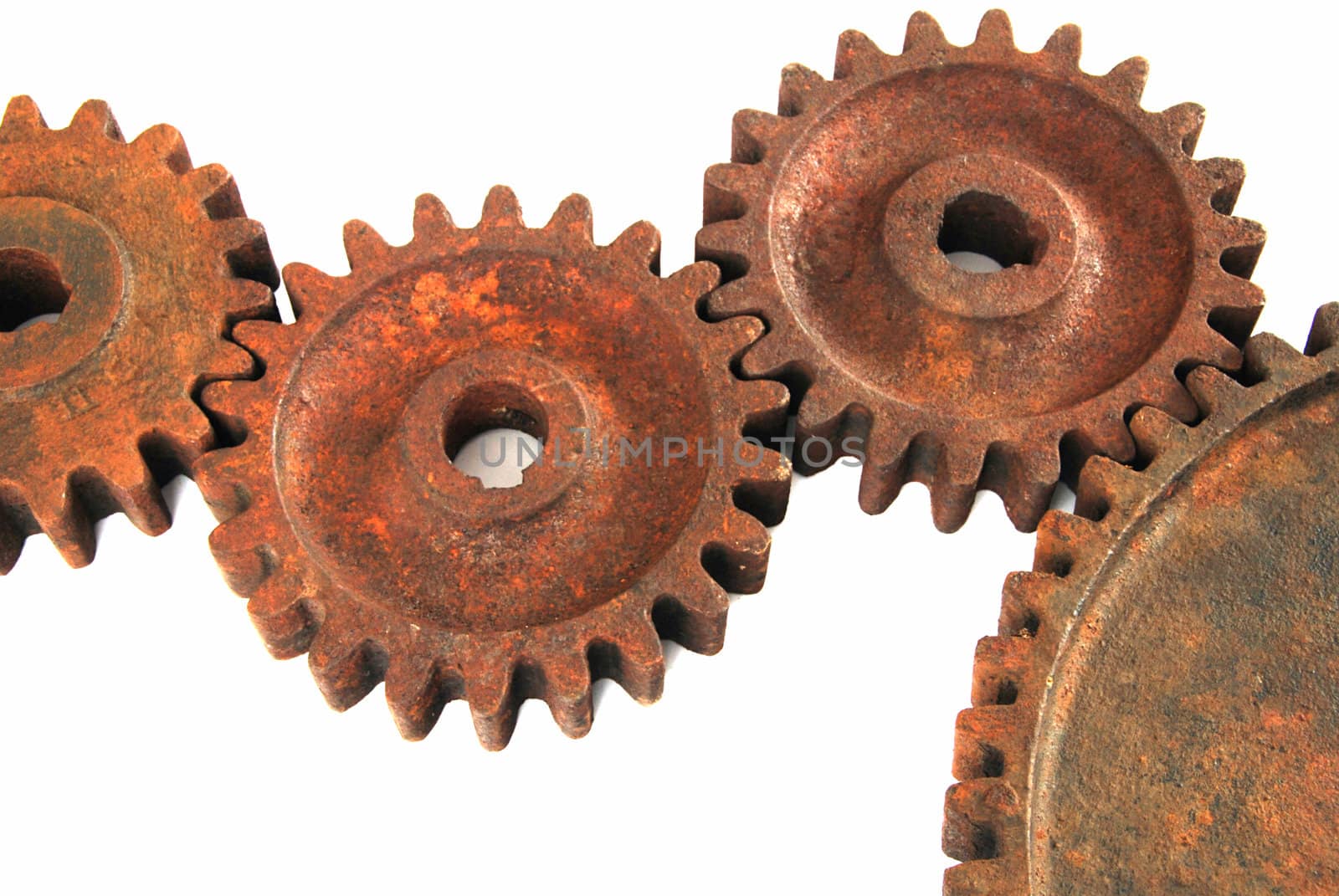 Old rusty gear cogs isolated on white background