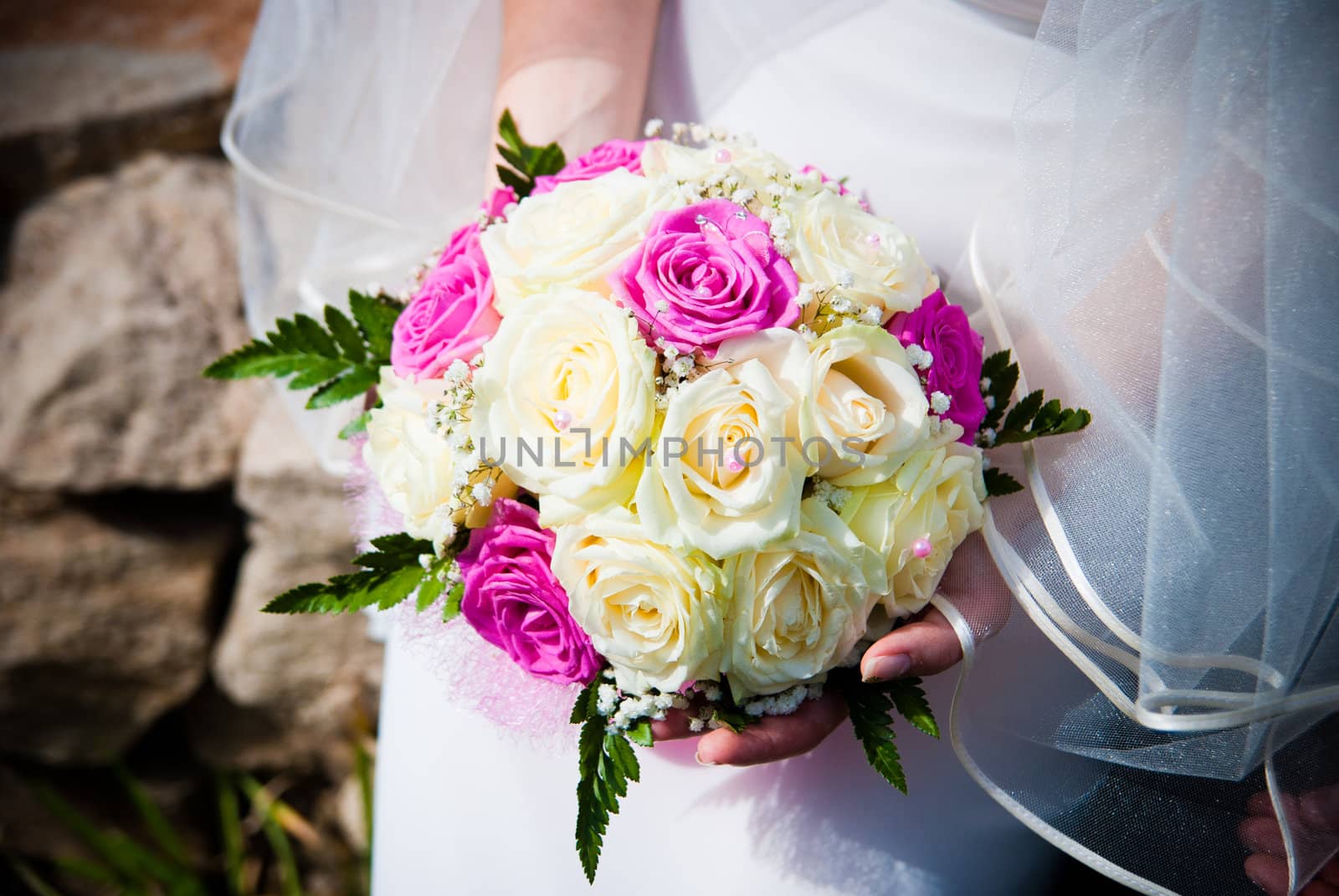 Bridal bouquet in the hand of bride