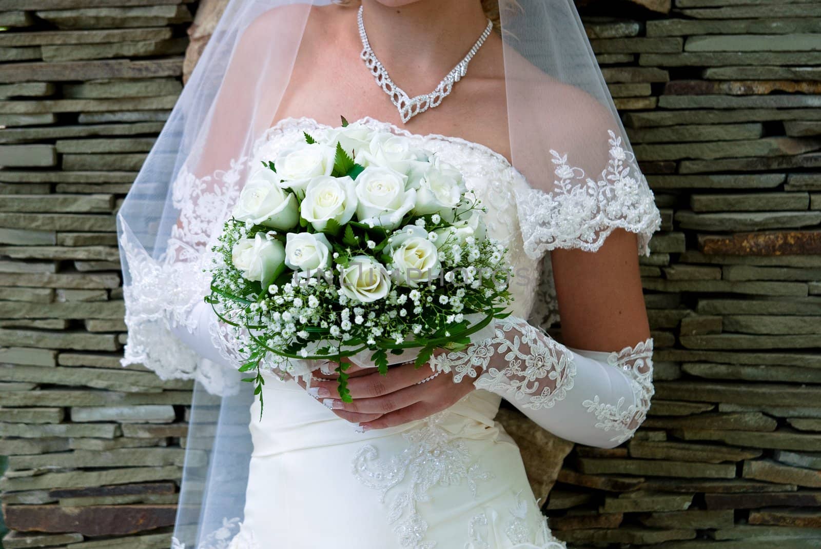 Bridal bouquet in the hand of bride