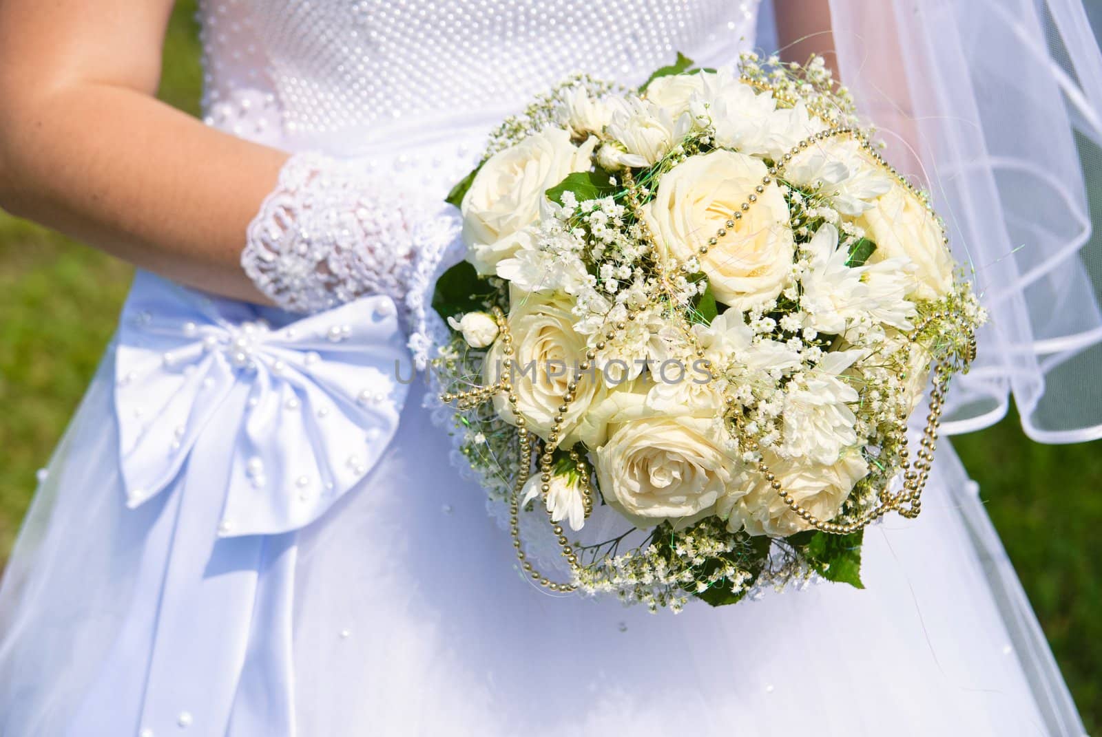 Bridal bouquet in the hand of bride
