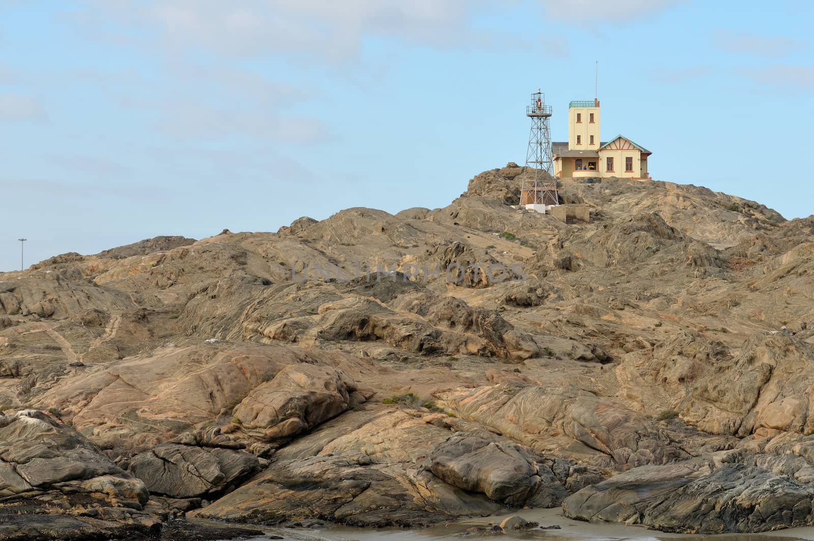 The old and the new lighthouses on Shark Island at the seaside town of Luderitz in Namibia. The old lighthouse is being used as a guest house