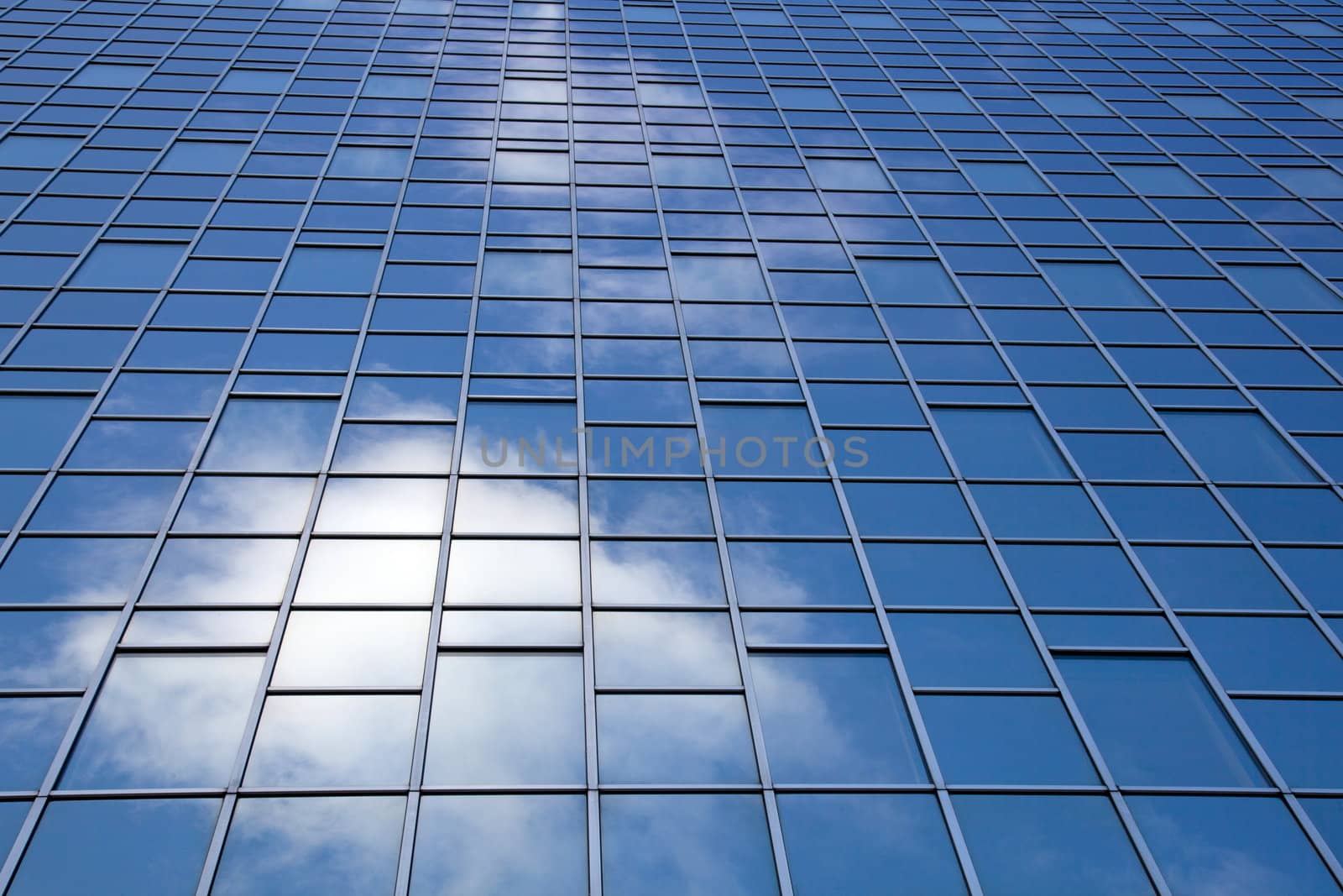 reflection of clouds in modern facade by ahavelaar