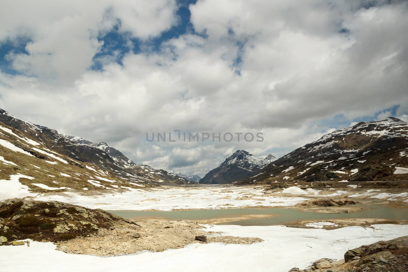 The Bernina Pass (el. 2328 m.)  is a high mountain pass in the Bernina Range of the Alps