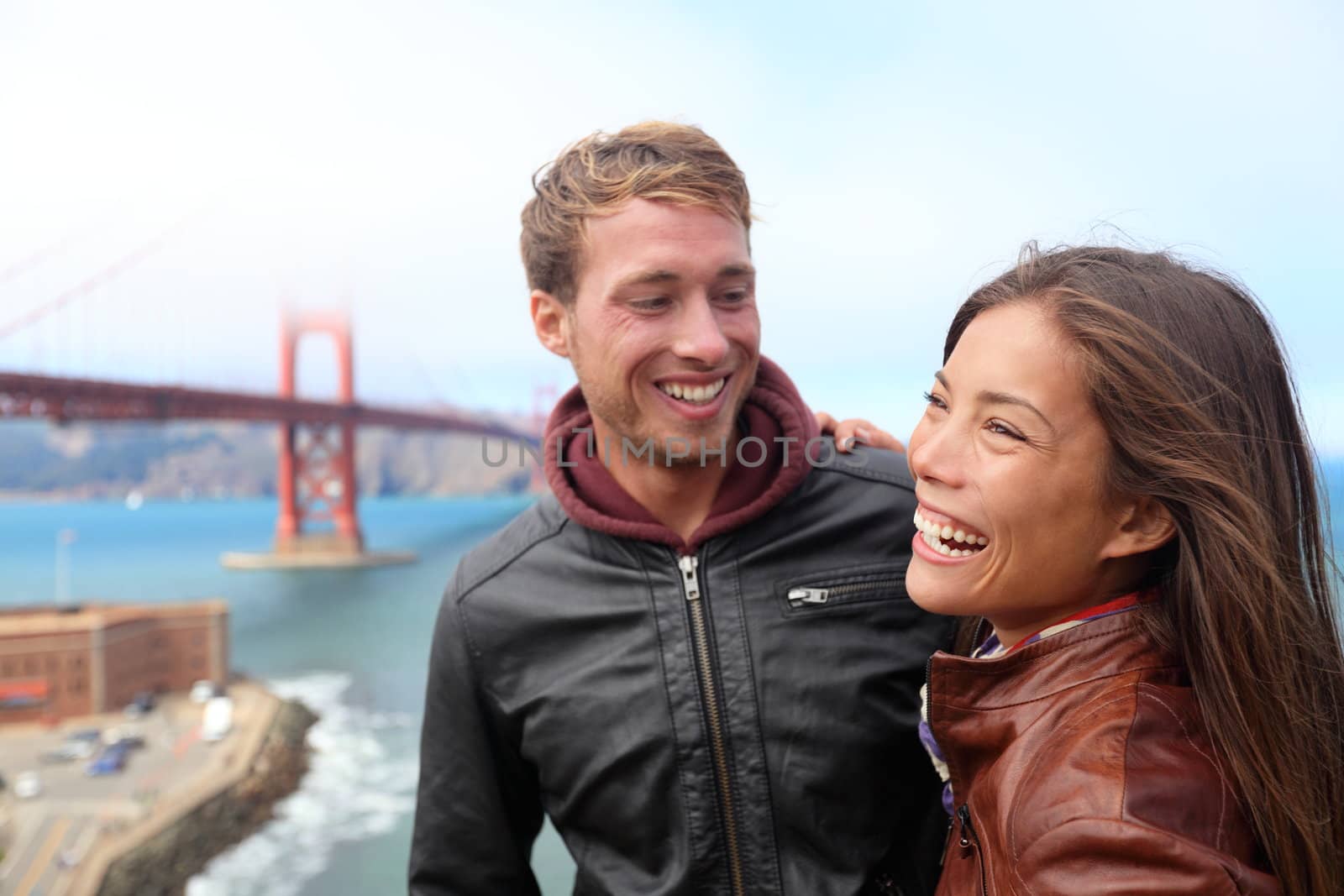 Happy young couple laughing, San Francisco by Maridav