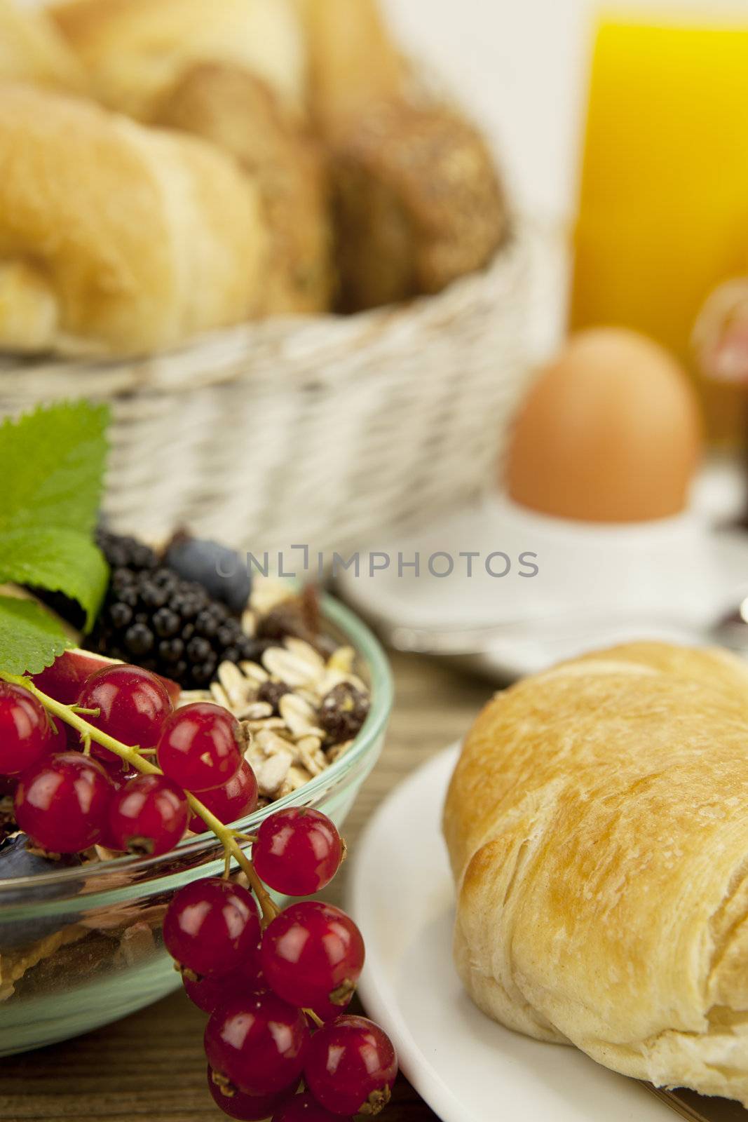 traditional french breakfast in morning on wooden background