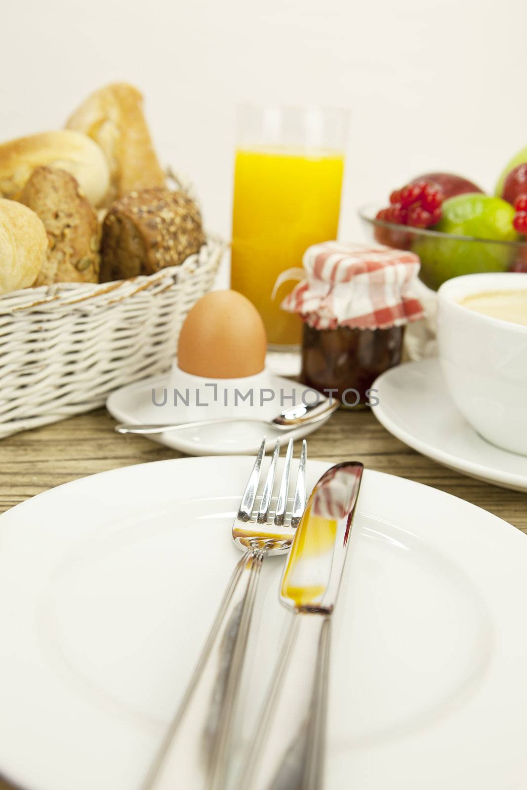 traditional french breakfast in morning on wooden background