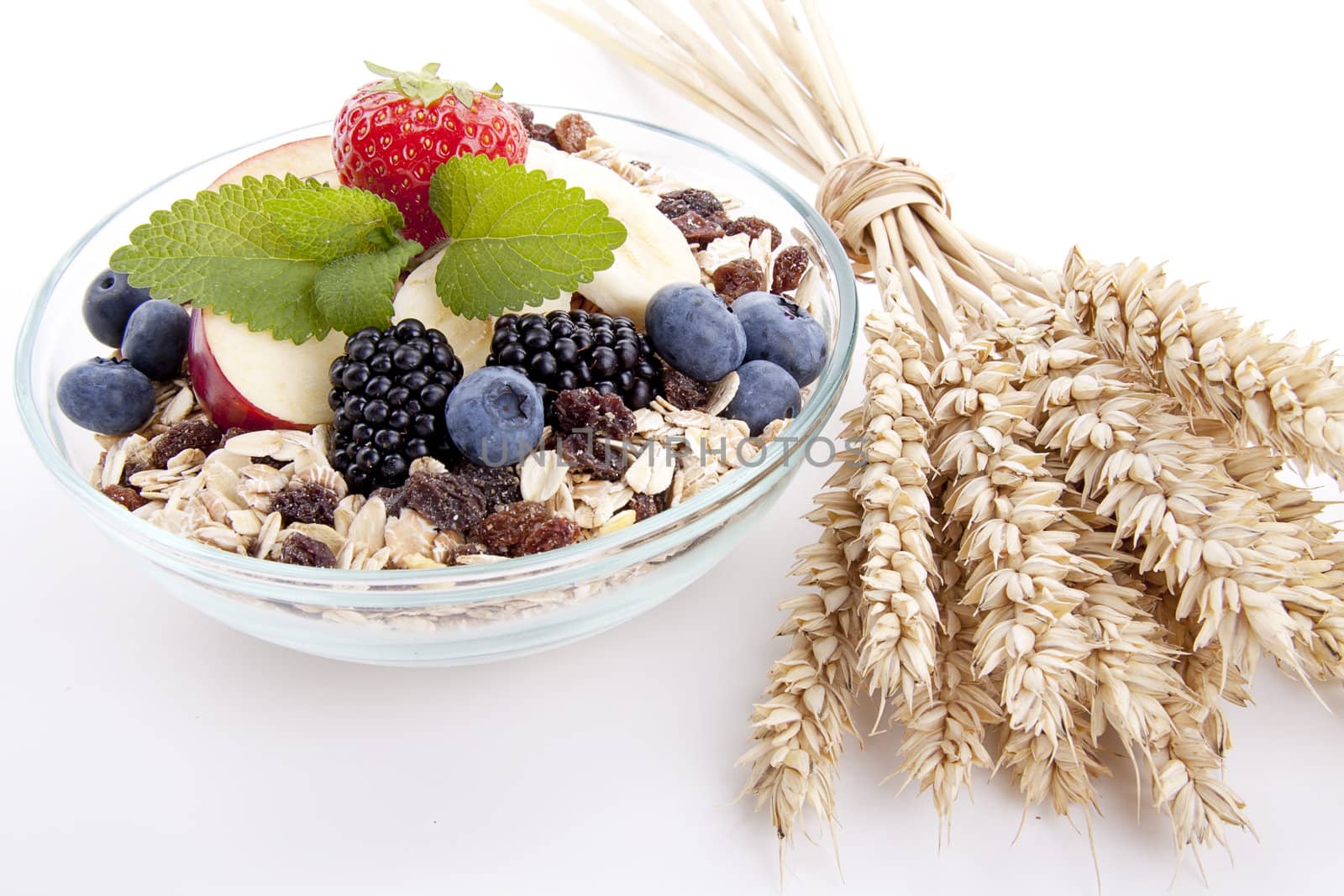 deliscious healthy breakfast with flakes and fruits isolated on white background