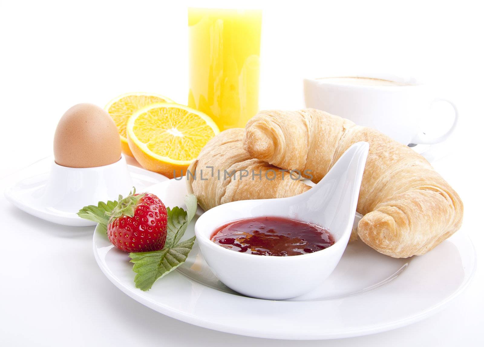 traditional french breakfast croissant isolated on white background