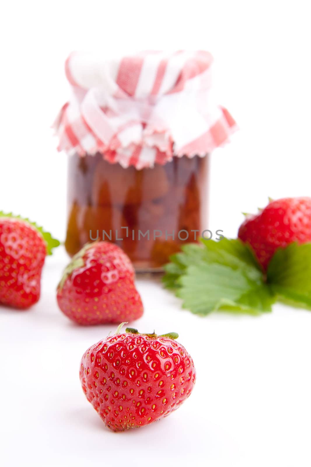 deliscious strawberry jam with fresh fruits for breakfast isolated on white background