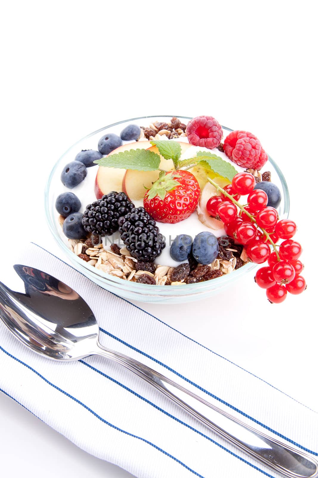 deliscious healthy breakfast with flakes and fruits isolated on white background
