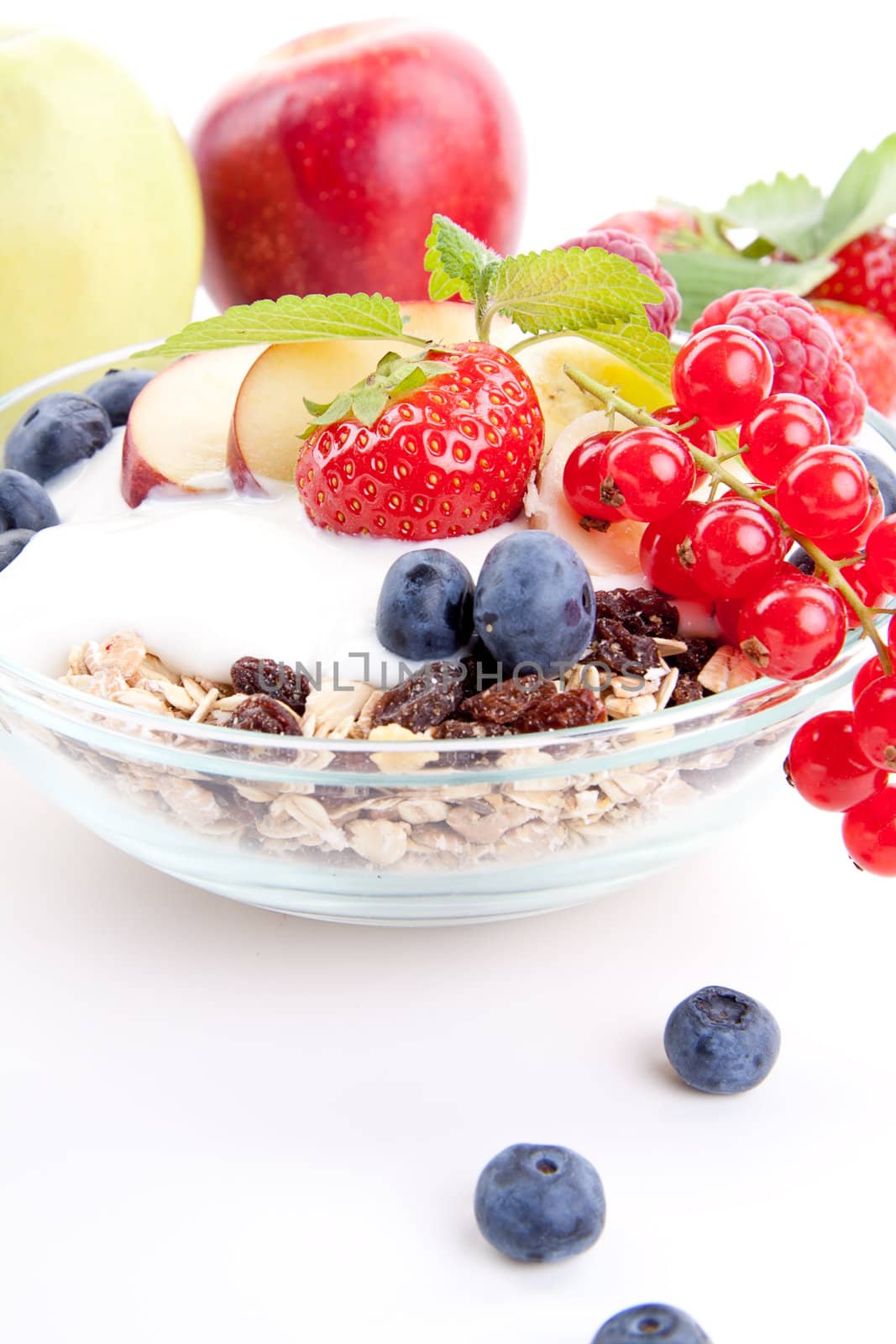 deliscious healthy breakfast with flakes and fruits isolated on white background