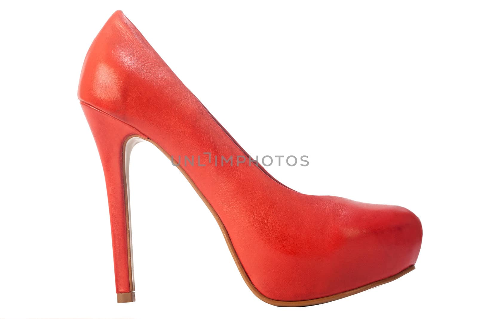 A single red, very elegant, high heel ladies shoe, isolated on a white background.