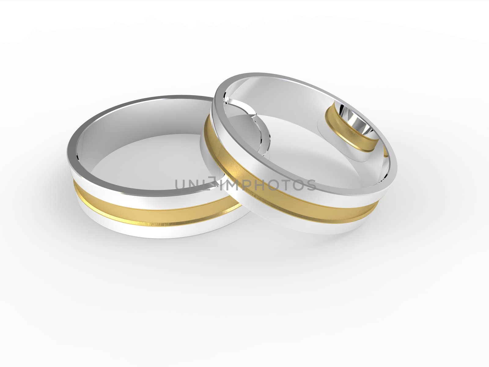 Golden and silver wedding rings isolated on white background