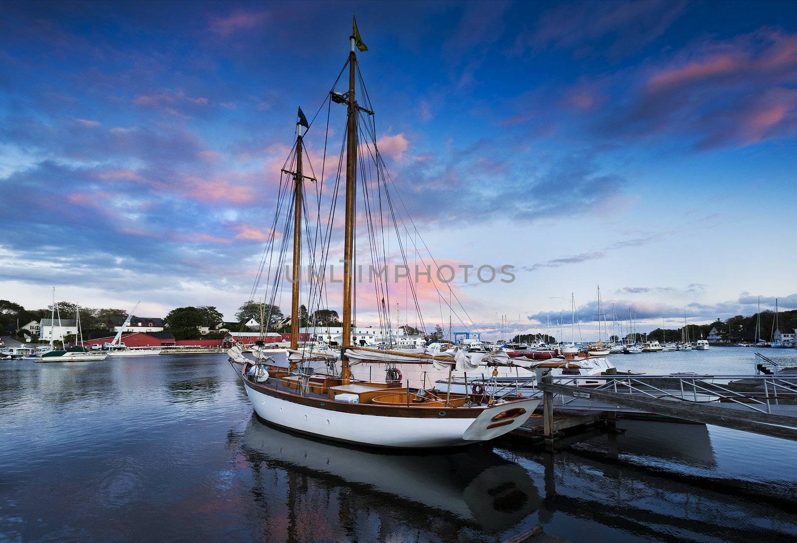 Sailing sloop in Camden harbor, Maine, USA