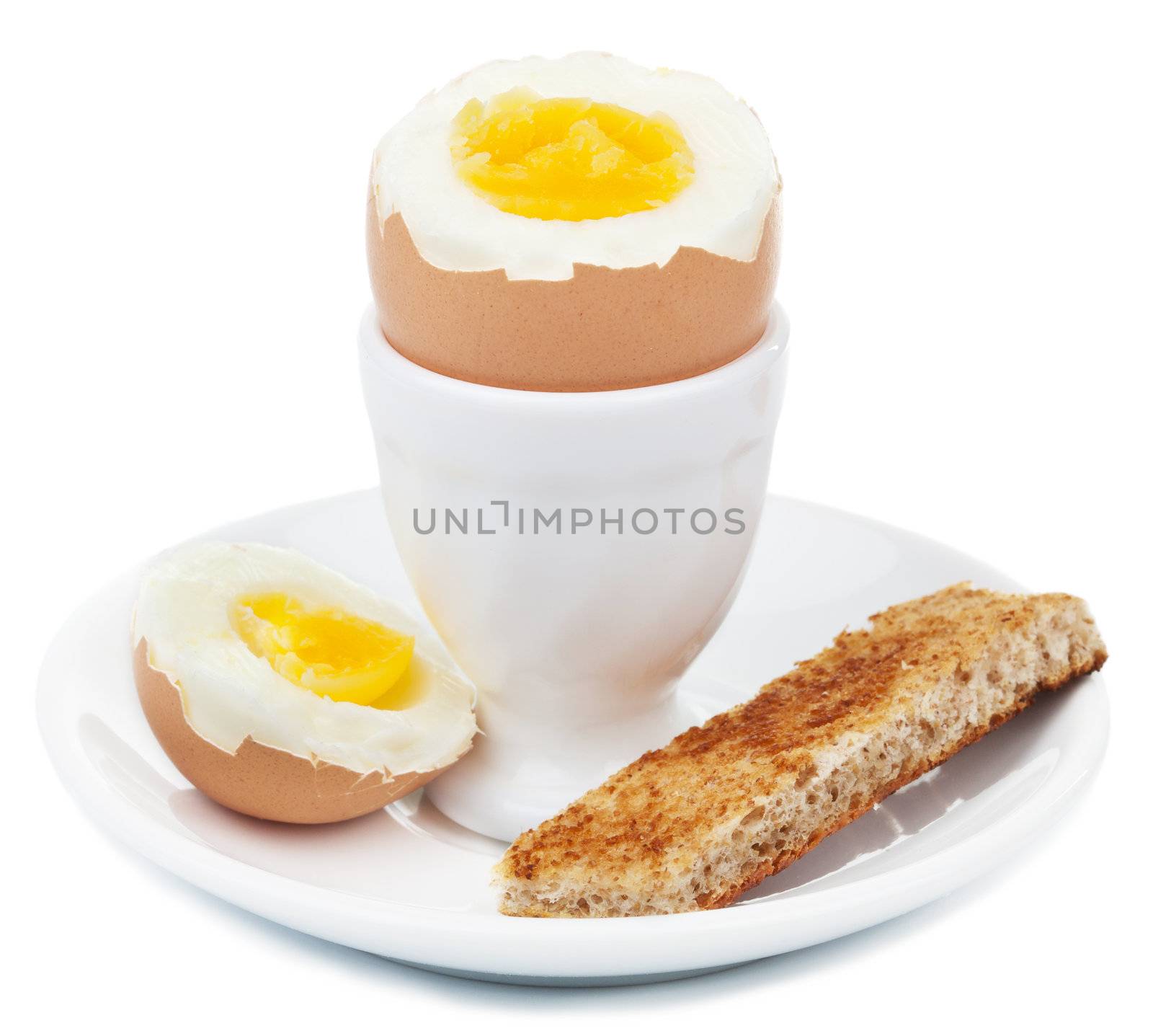 boiled egg in eggcup isolated by duskbabe