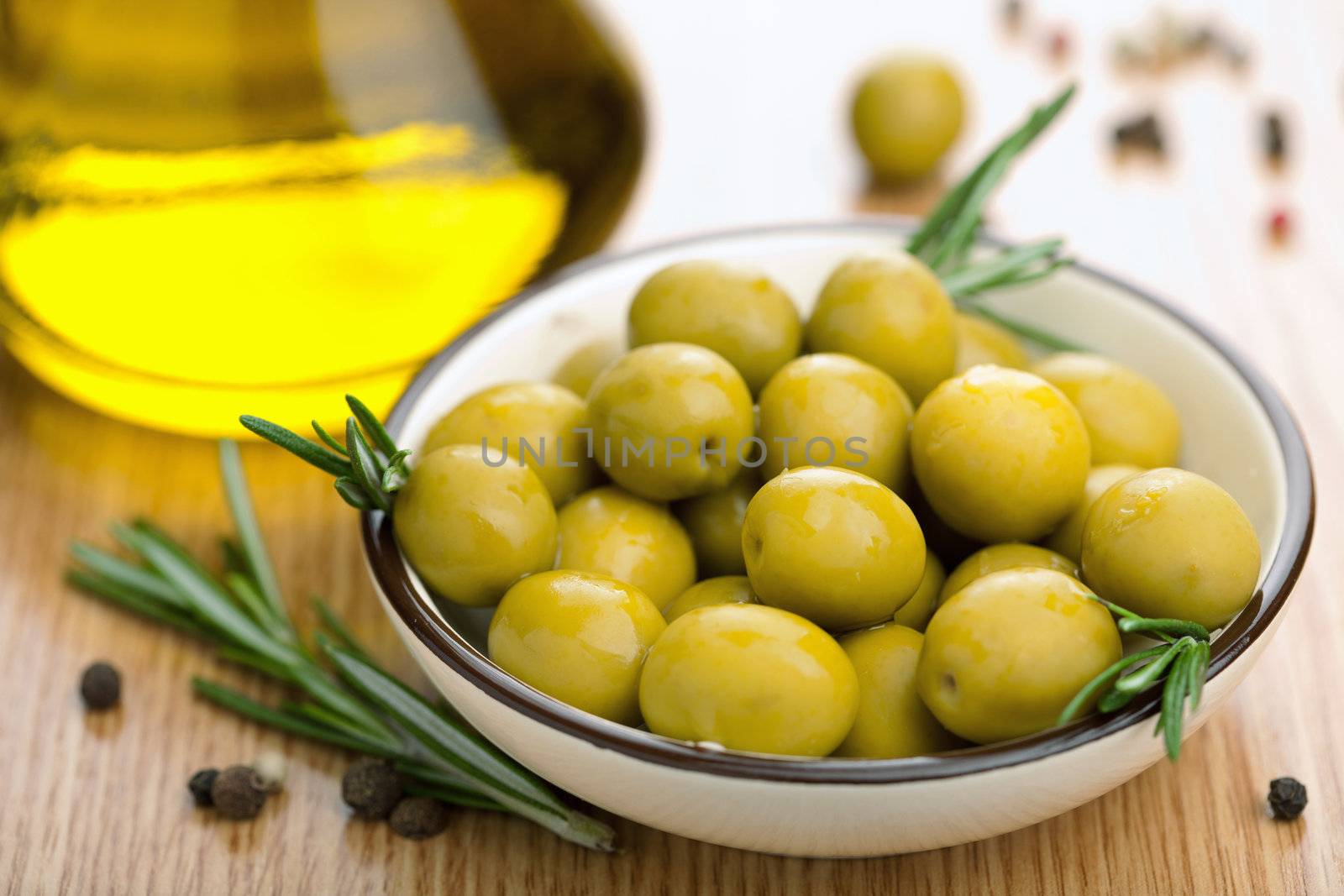 green olives and oil  by duskbabe