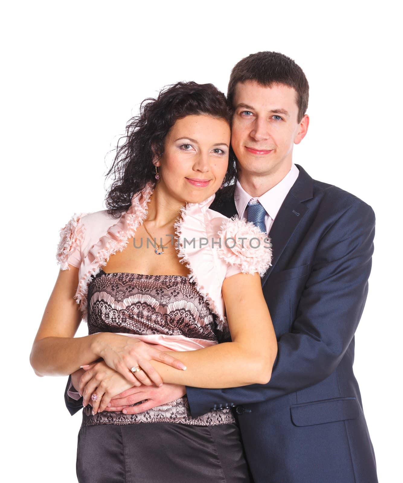 Sweet happy young couple smiling together. Isolated on white background