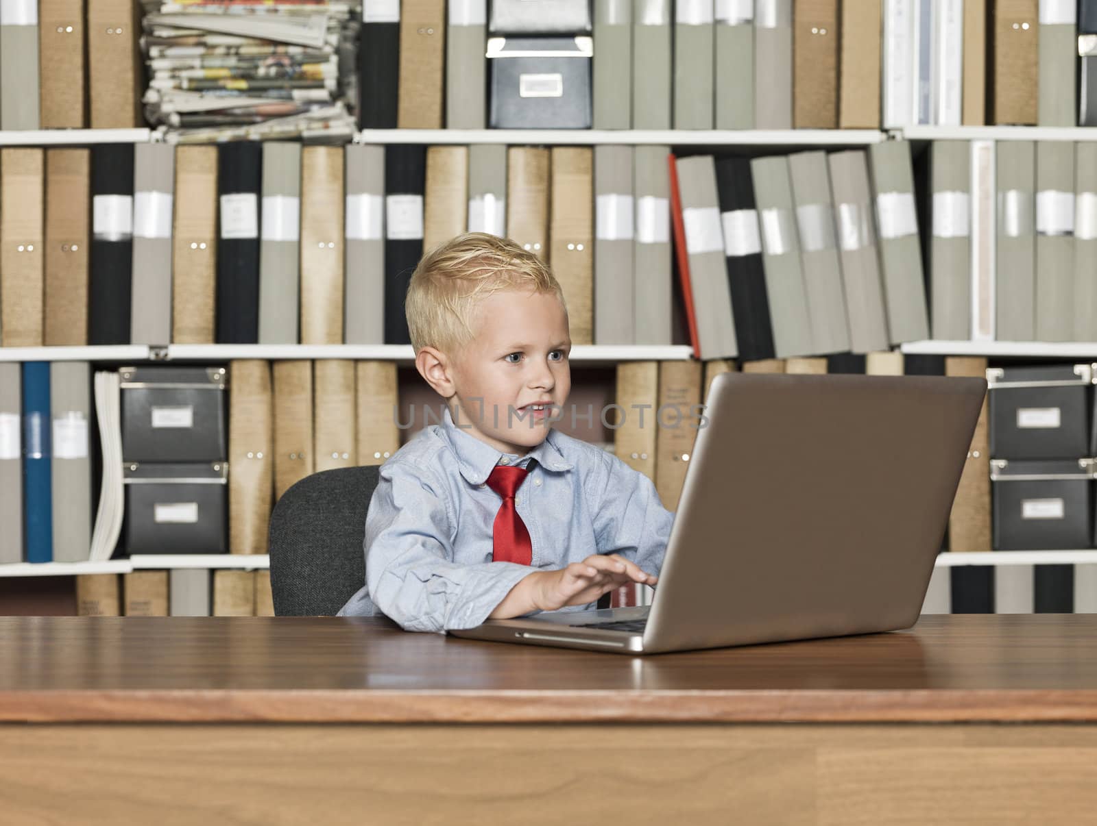 Young Businessman with computer at the office
