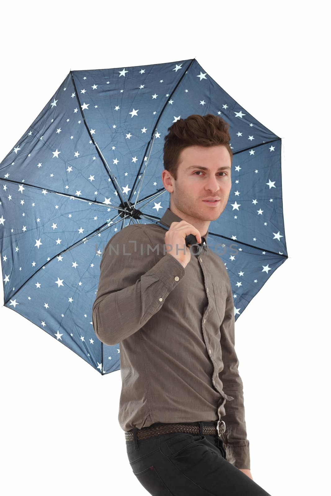 Handsome man with a blue umbrella with stars