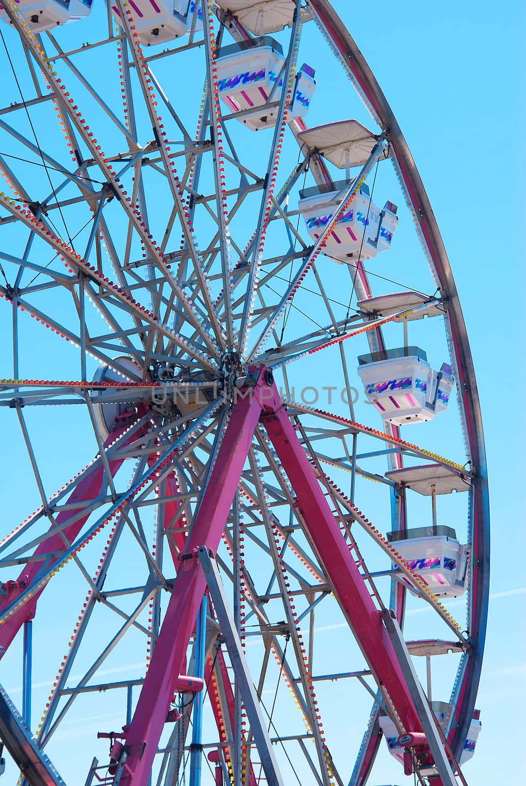 Brightly Colored Ferris Wheel by pixelsnap