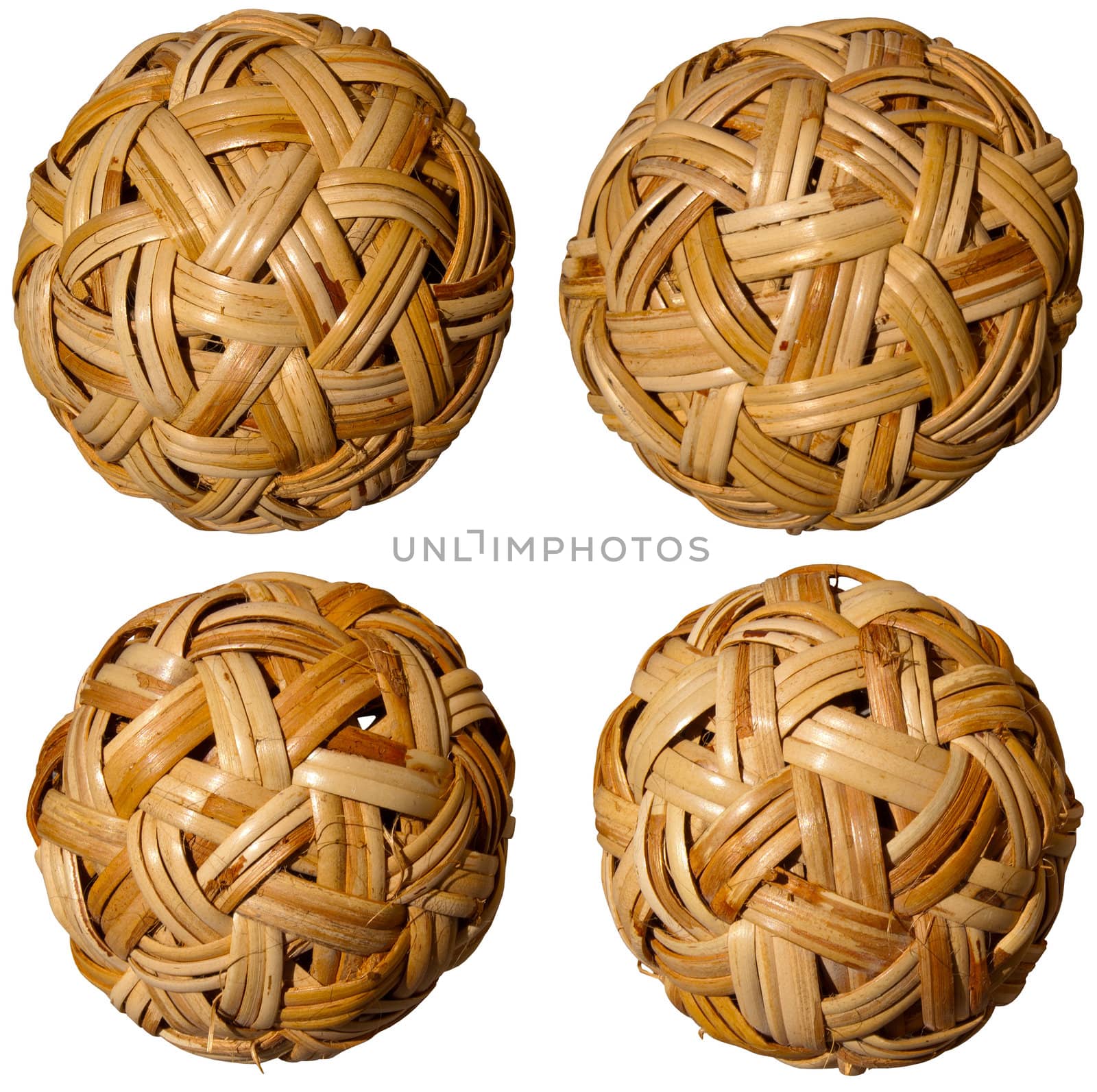 Set of brown woven bamboo balls on white background
