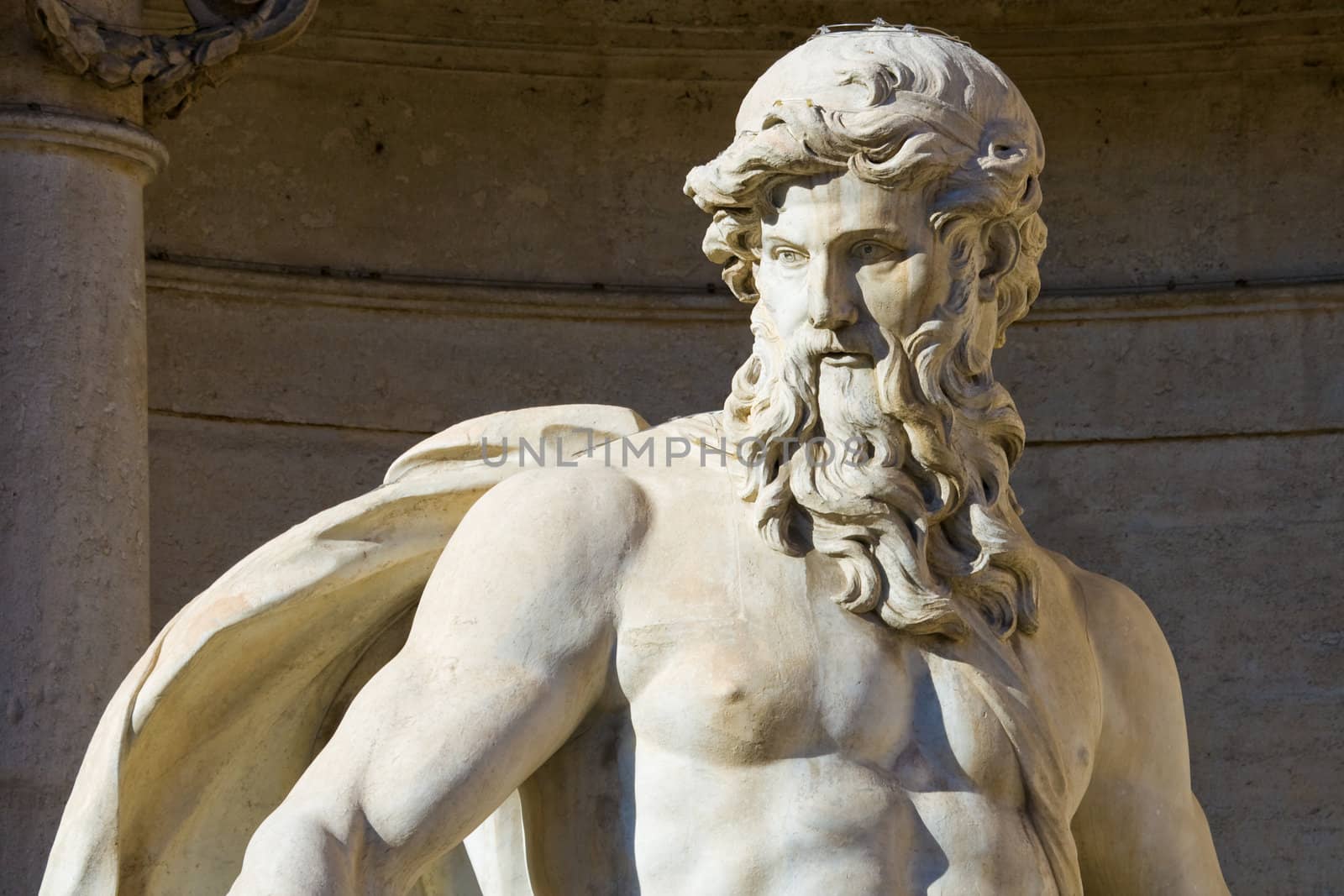 Close up of the Neptune statue of the Trevi Fountain in Rome, Italy