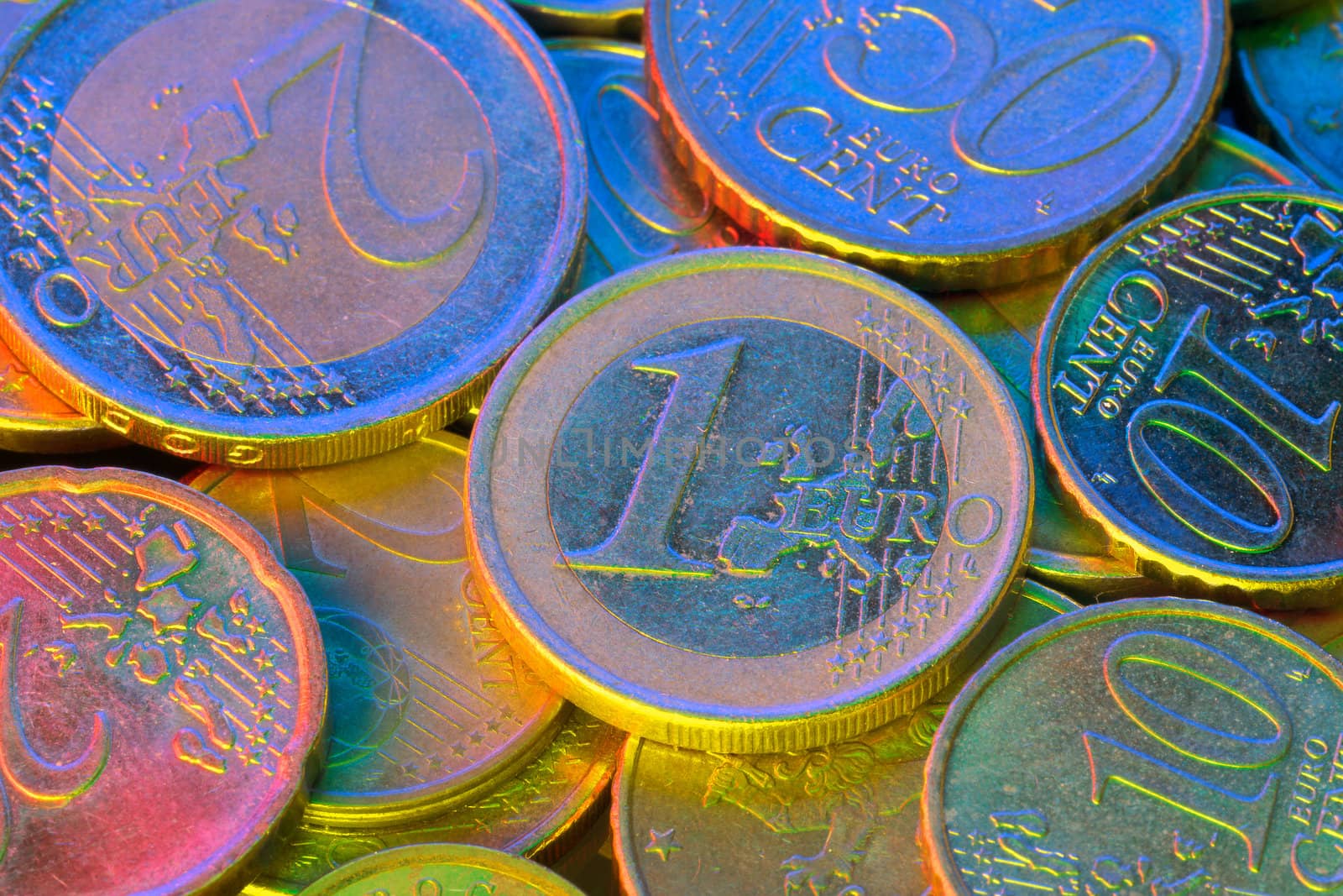 Euro coins, illuminated by colored light by Antartis