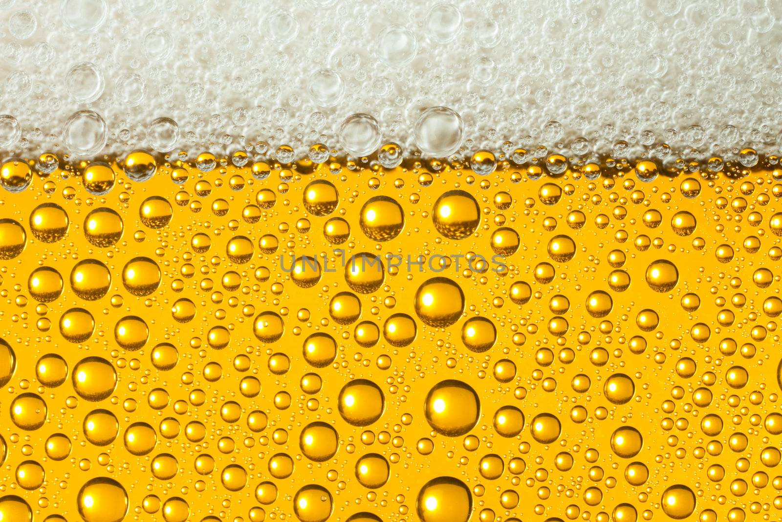 Close-up of sweaty glasses of beer with drops of water