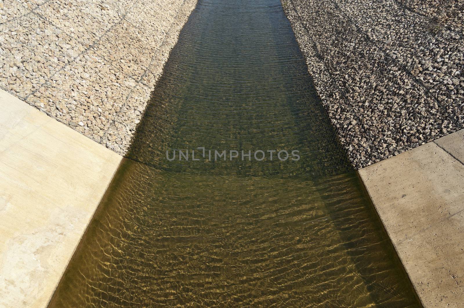 Water diversion canal upstream the Alvito reservoir near Oriola village, part of the Alqueva Irrigation Plan, Alentejo, Portugal