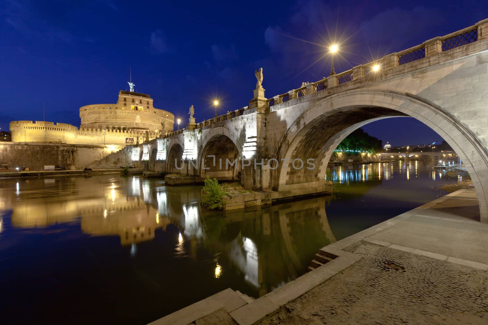 Evening view of Rome, the River Tiber, Castle Sant'Angelo and bridge